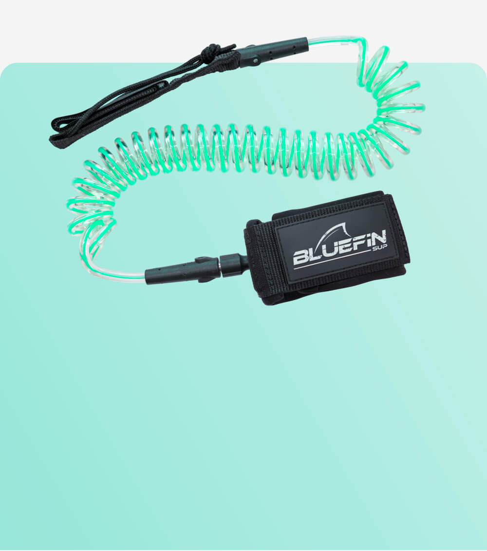 Coiled safety leash with a black strap and BLUEFIN SUP logo, designed for paddleboarding.