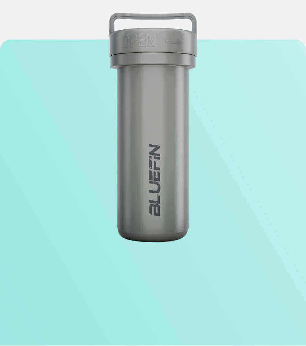 Gray waterproof container with an open lid and the word BLUEFIN printed on the side