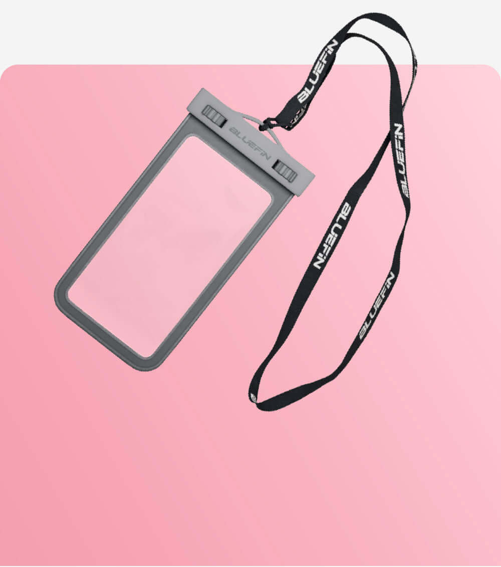 Waterproof phone pouch with gray frame and adjustable black lanyard on pink background