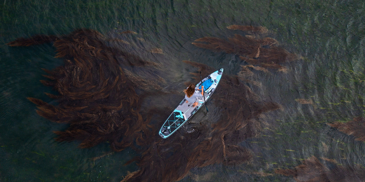 woman paddleboarding