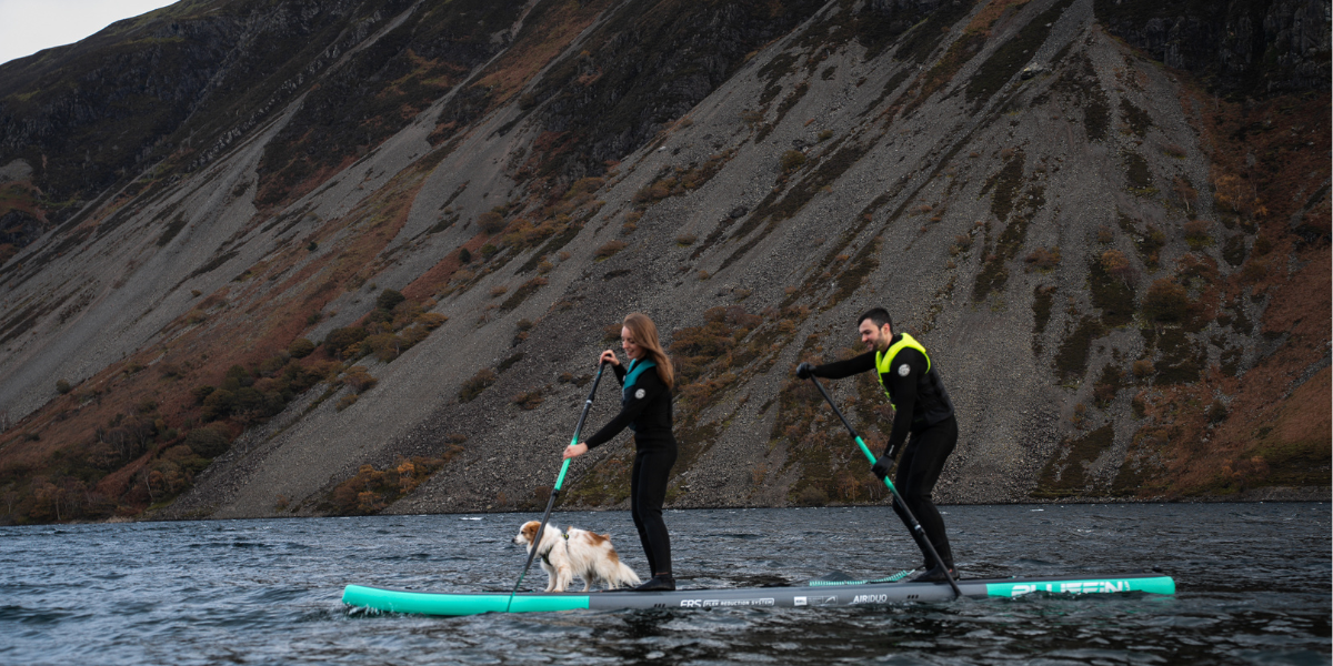 Two people on SUP paddleboarding