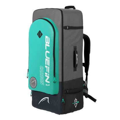 Sac à dos gris et teal avec logo, conçu pour transporter des planches à pagaie, avec des sangles rembourrées et des fermetures éclair.