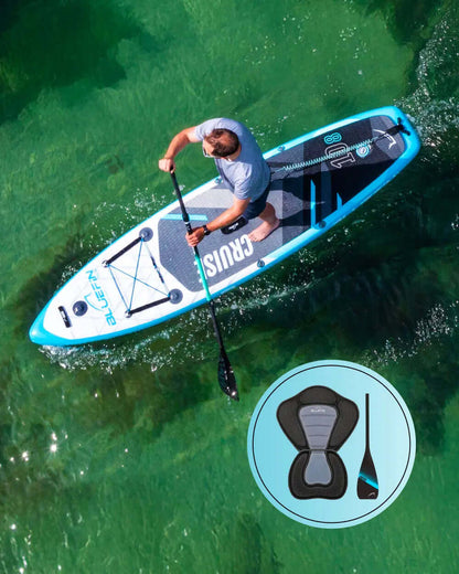 Man paddleboarding on a bluefin cruise inflatable stand up paddle board on the ocean, showcasing on the side that it also comes with a kayak seat 